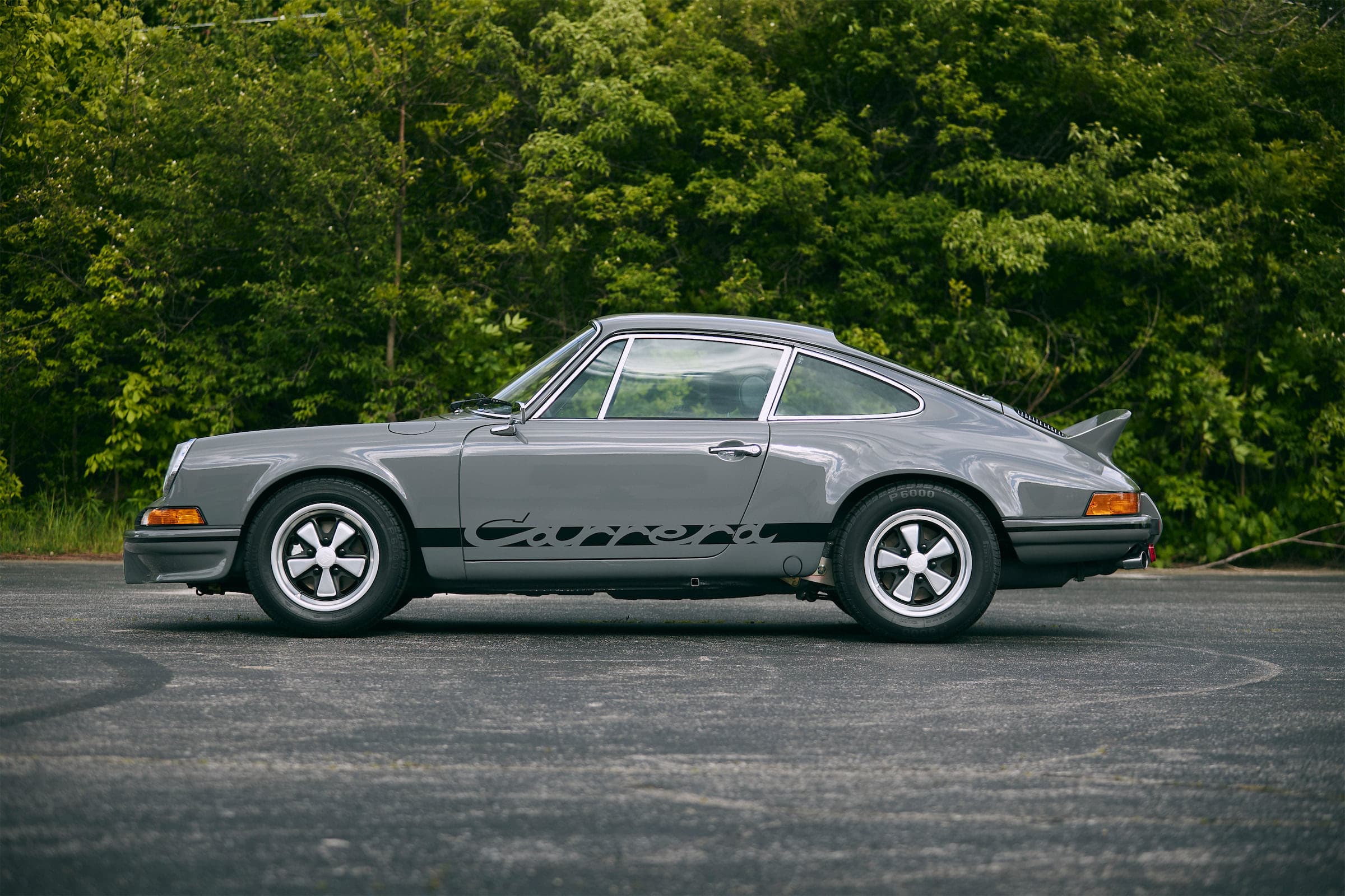 Grey Porsche 911 Carrera RS photographed in profile